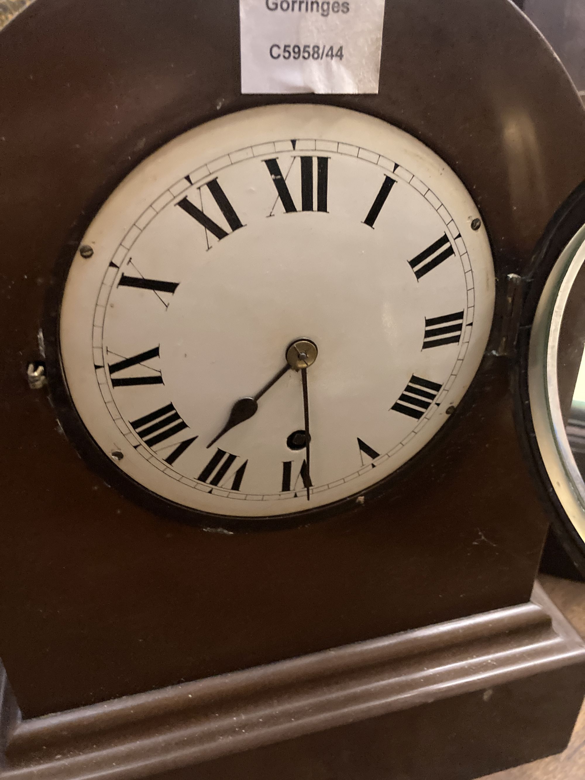 A mahogany mantel timepiece, height 38cm